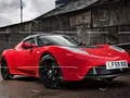 Logħba Puzzel Tesla Roadster onlajn