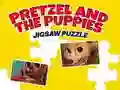 Logħba Pretzel u l-puppies Puzzl onlajn Logħba Pretzel u l-puppies Puzzl onlajn