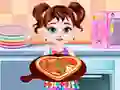 Logħba Kunsinna ta' pizza ma' Baby Taylor onlajn